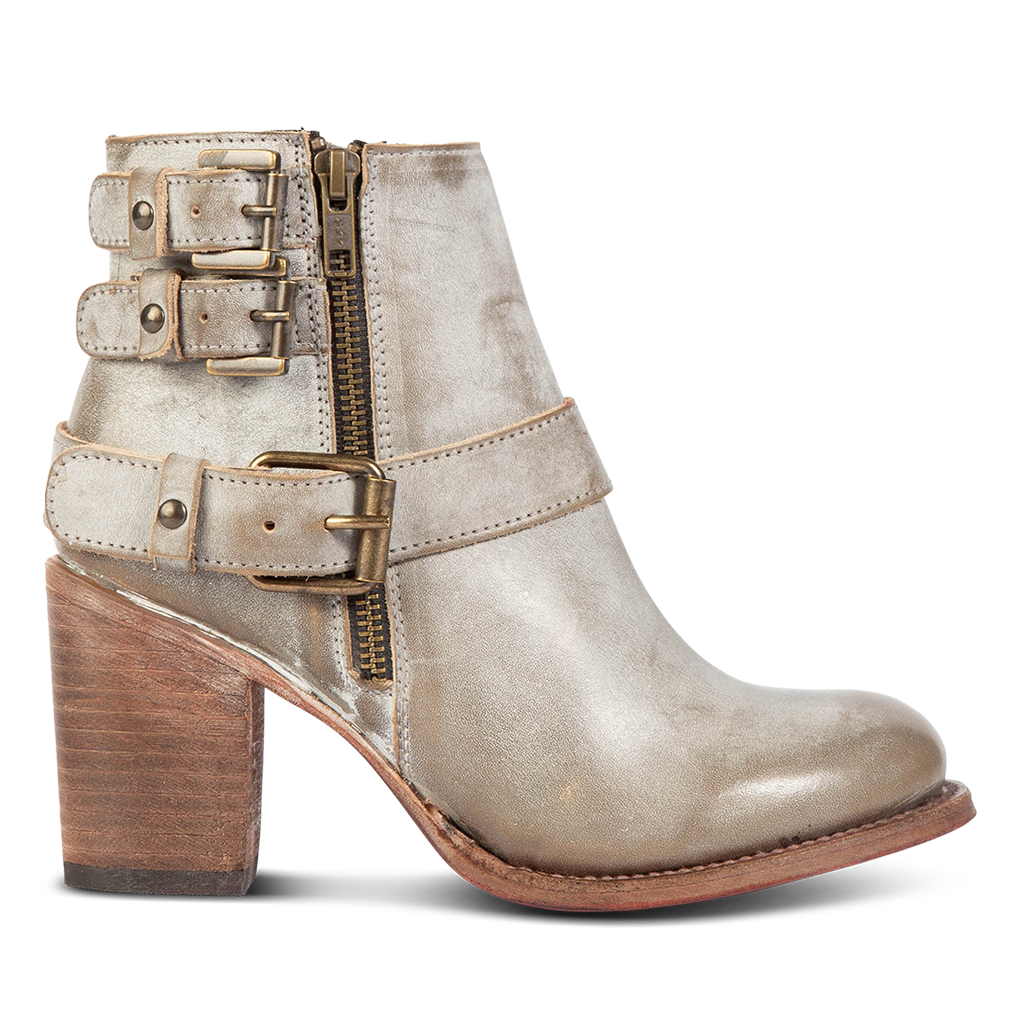 FREEBIRD women's Bolo ice ankle bootie with double zip closures and fashion buckles with brass hardware