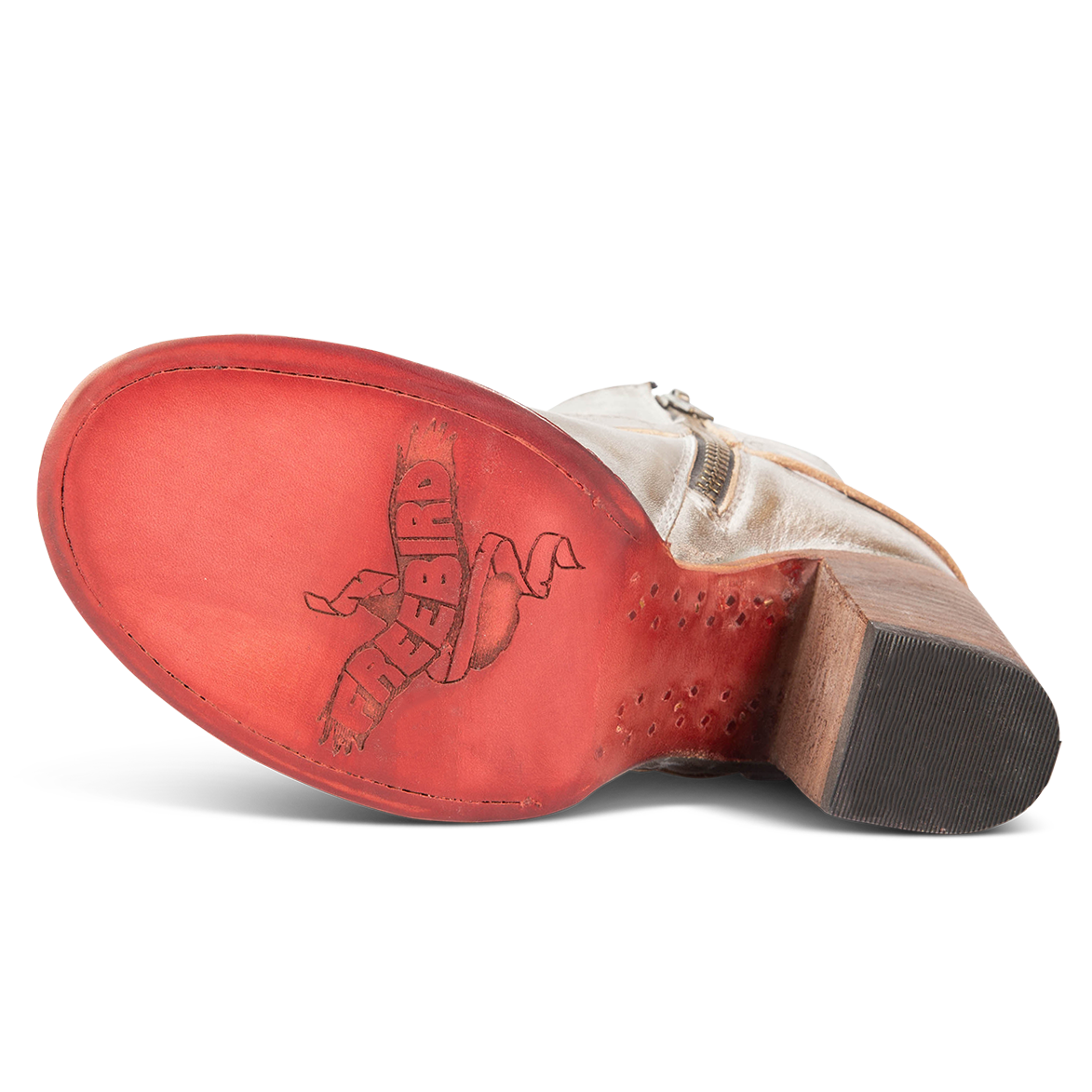 Red leather sole imprinted with FREEBIRD on women's Bolo ice ankle bootie