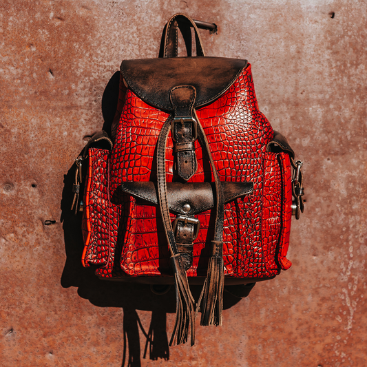 FREEBIRD Brett red croco embossed leather backpack with working exterior pockets and drawstring closure