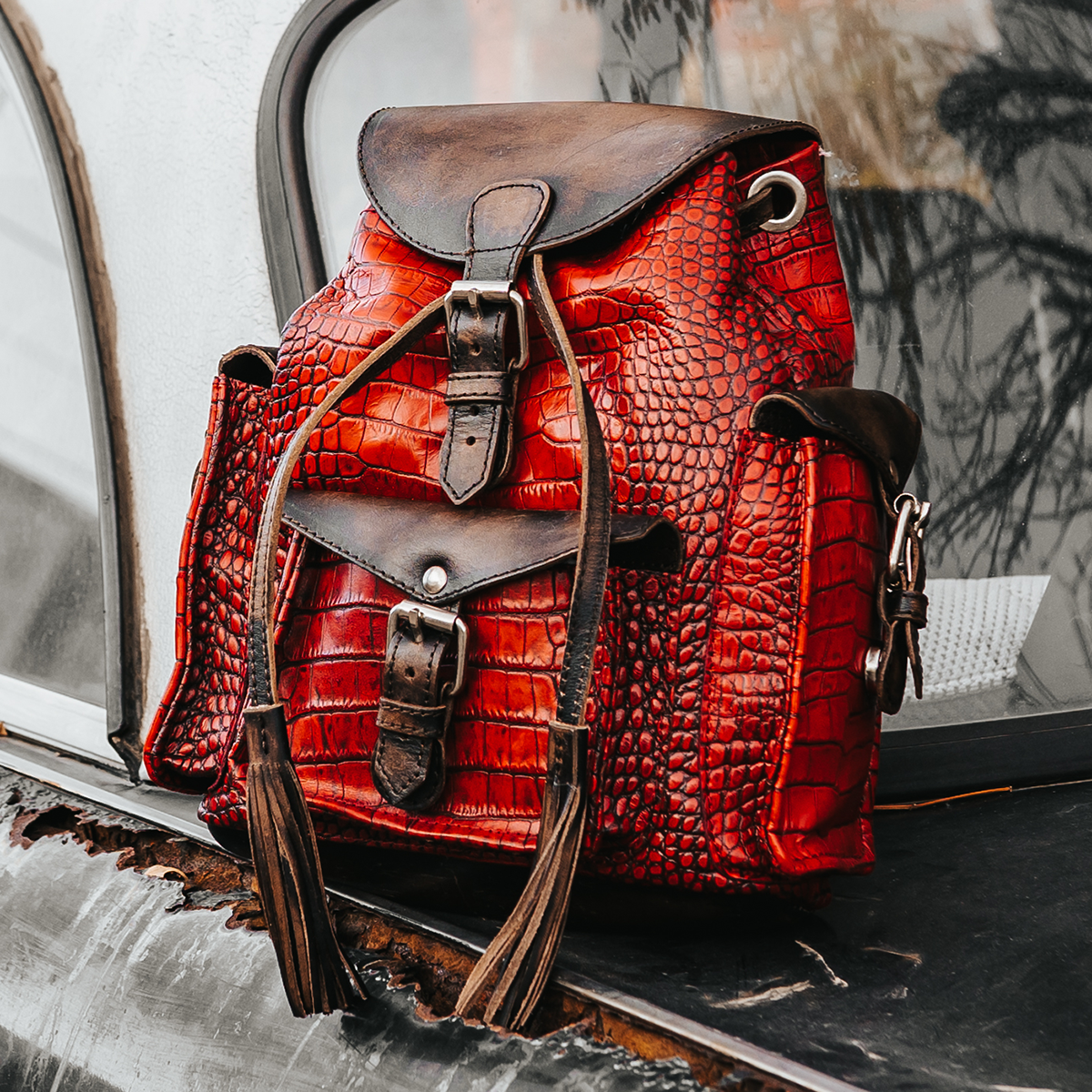 FREEBIRD Brett red croco embossed leather backpack with working exterior pockets and drawstring closure