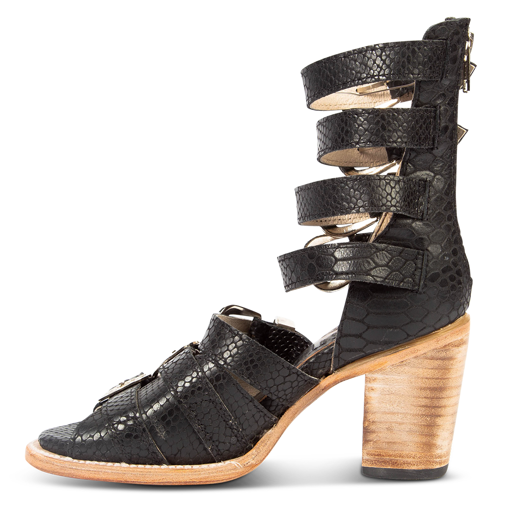 Inside view showing embossed leather straps and high-heel on FREEBIRD women's Brooklynn black snake sandal
