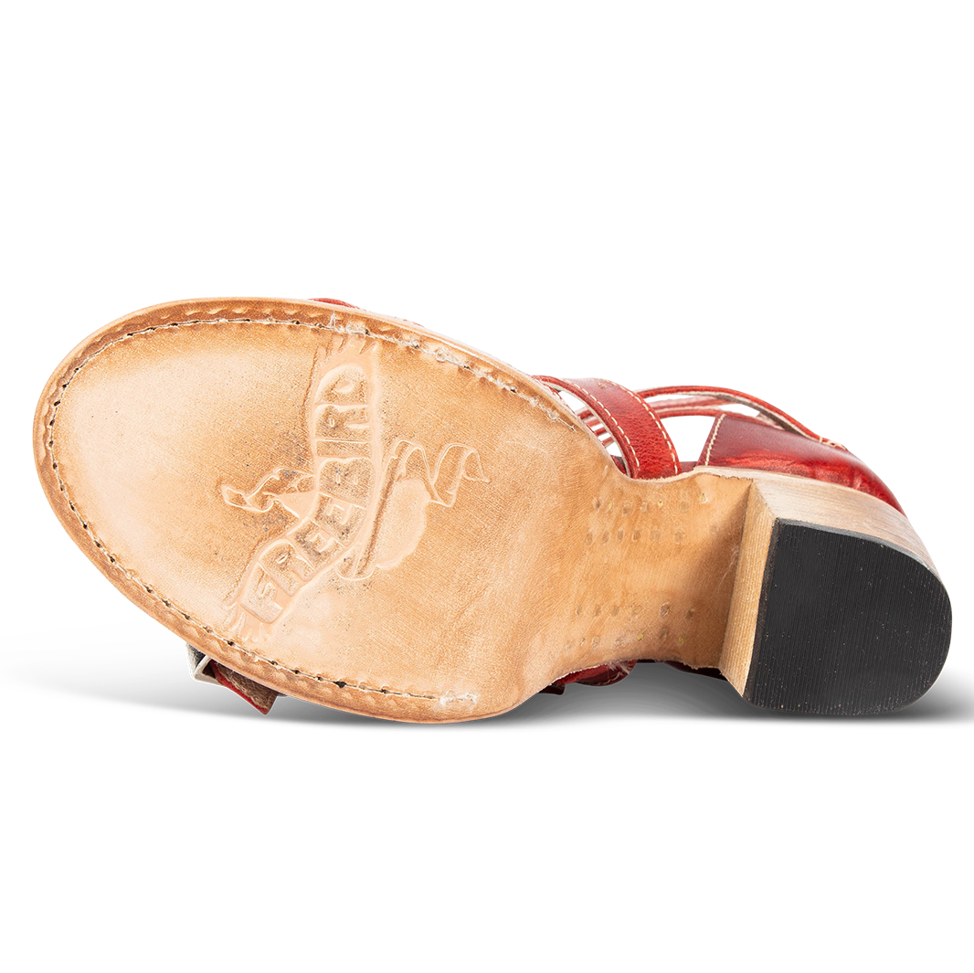 Leather sole imprinted with FREEBIRD on women's Brooklynn red sandal