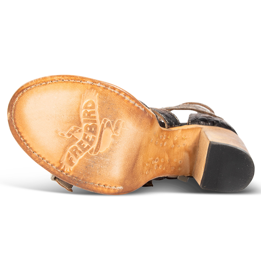Leather sole imprinted with FREEBIRD on women's Brooklynn vintage croco sandal