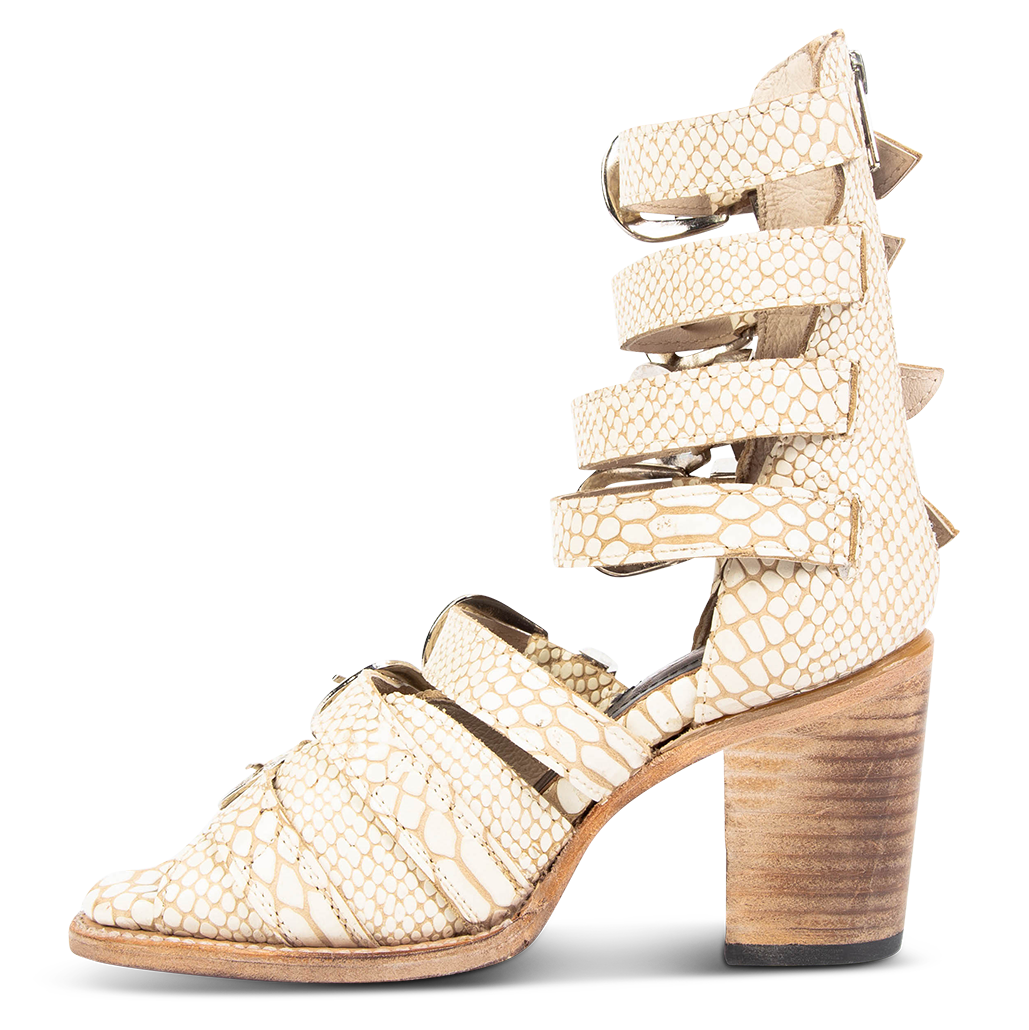 Inside view showing embossed leather straps and high-heel on FREEBIRD women's Brooklynn white snake sandal
