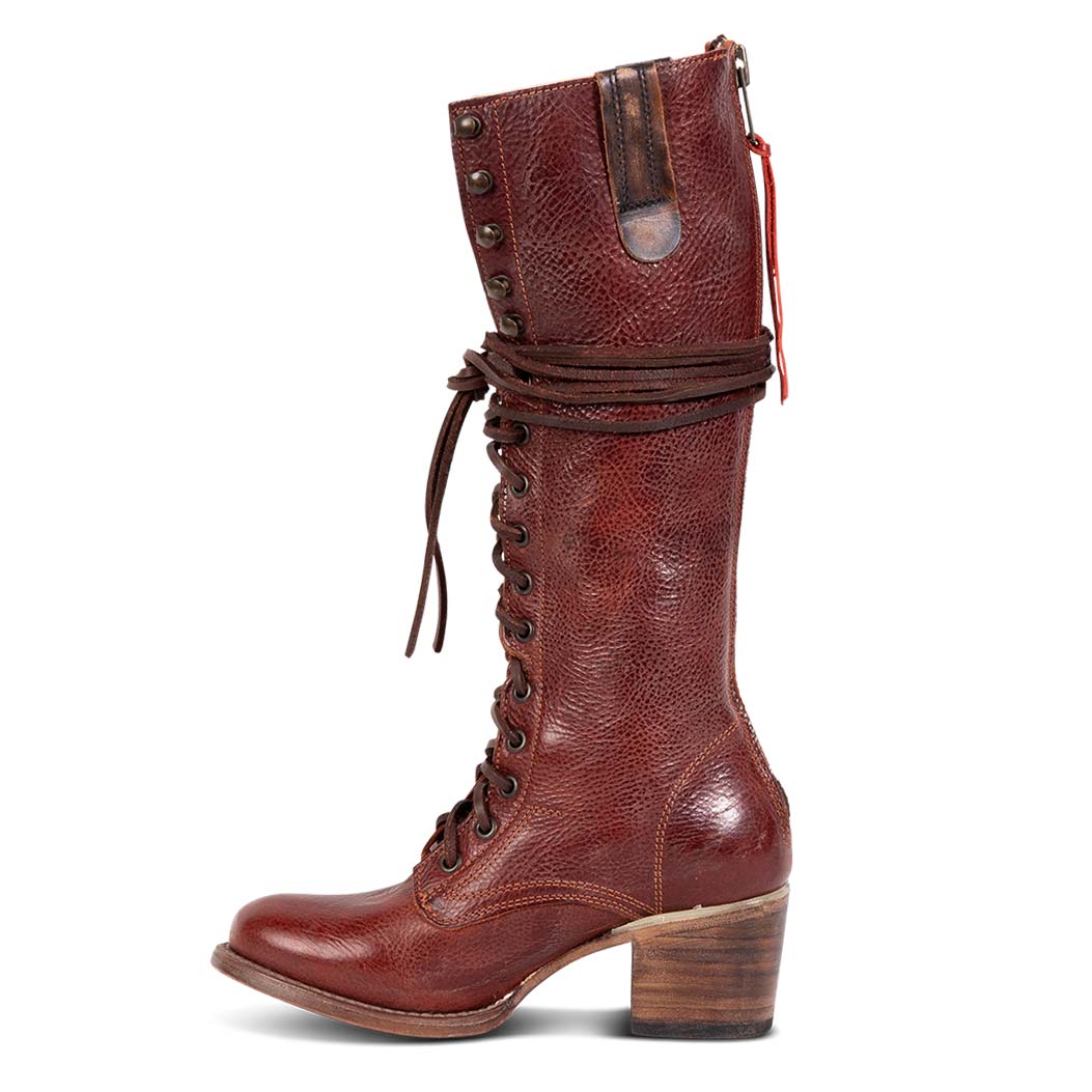 Inside view showing accent pull strap and wrap around leather laces on FREEBIRD women's Grany wine tall boot