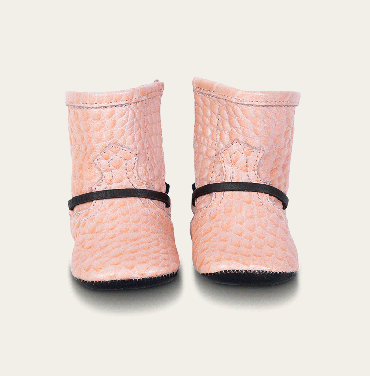 front view showing contrasting front lace detailing on FREEBIRD infant baby coal pink croco leather bootie  