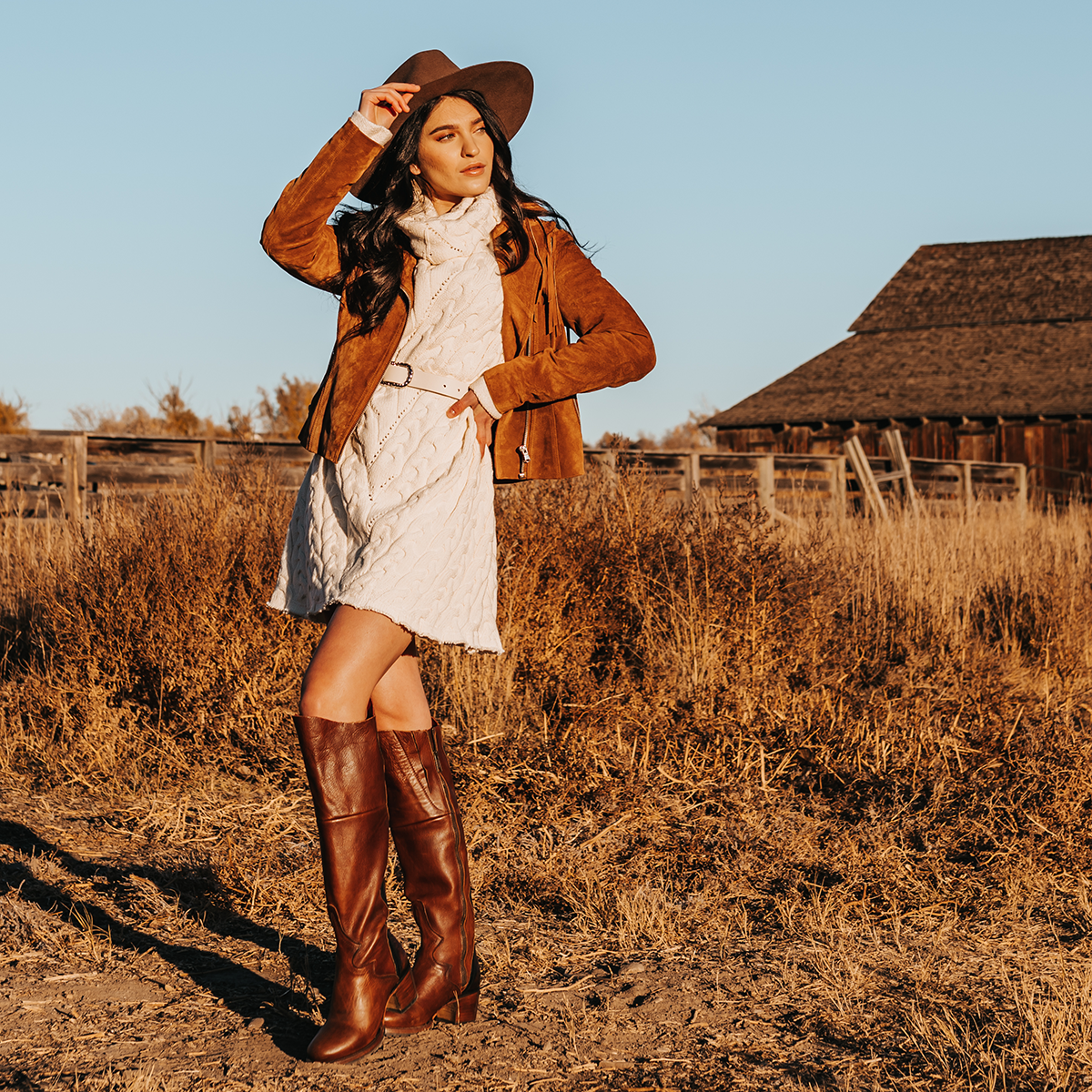FREEBIRD women's Calgary cognac leather heeled knee high boot with contrasting back panel and rubber tread sole lifestyle