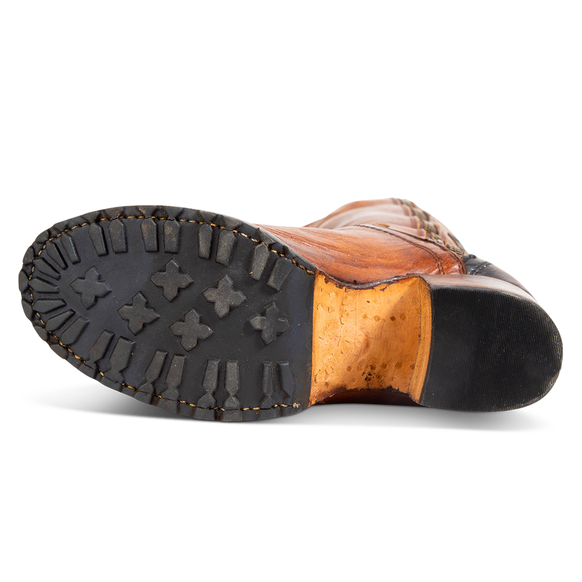 Rubber tread sole imprinted with FREEBIRD on women's Calgary cognac tall leather boot