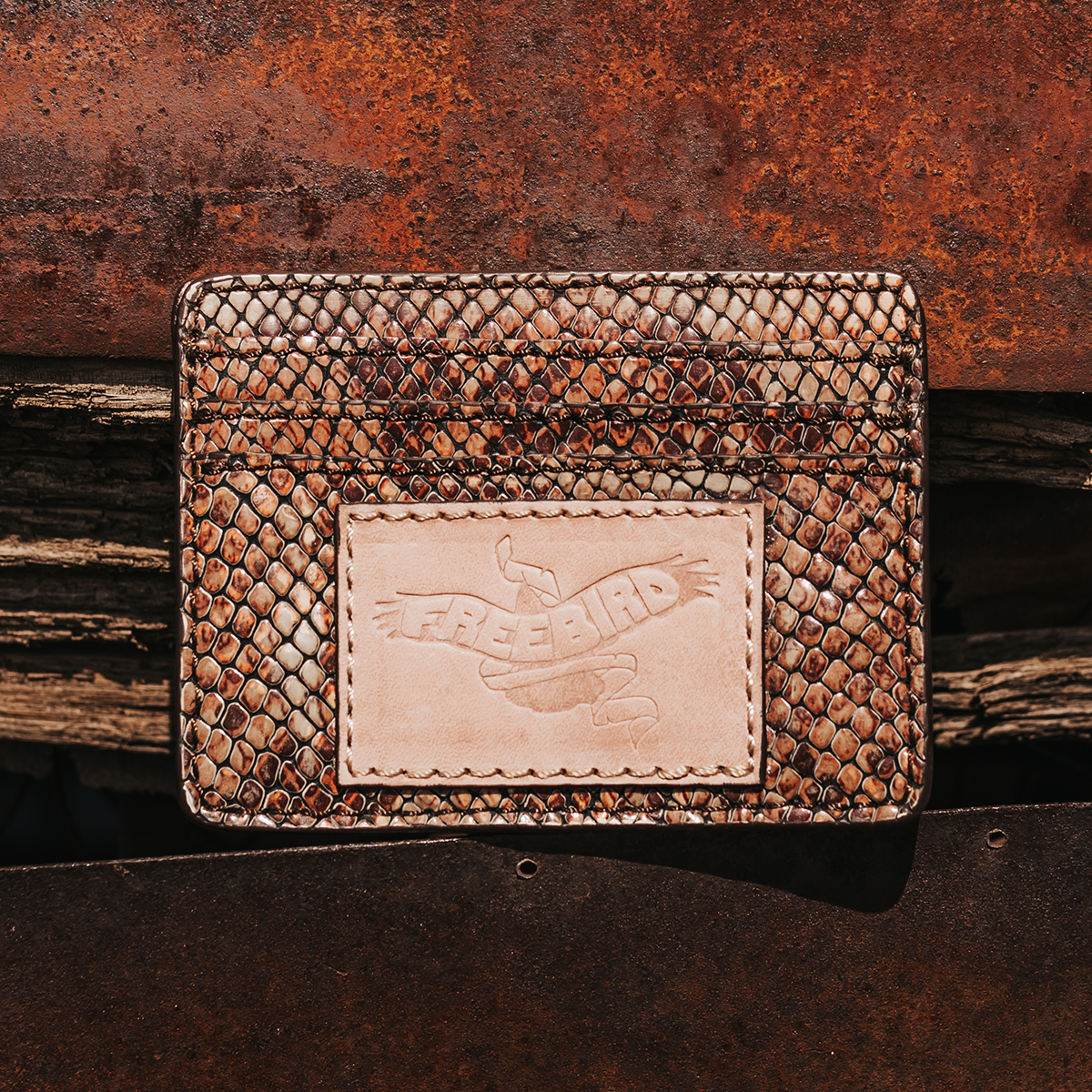 FREEBIRD CC Wallet pink snake cardholder featuring three cards slots
