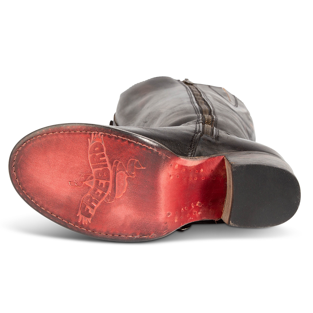 Red leather sole imprinted with FREEBIRD on women's Chapelle black multi boot