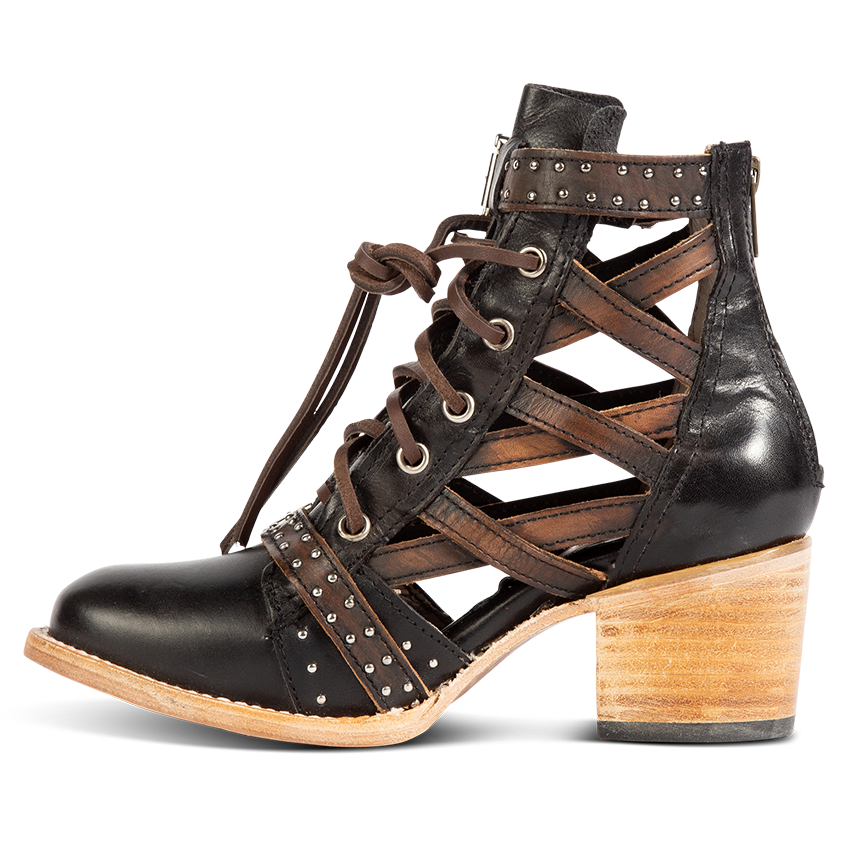 Inside view showing laser cut criss-cross leather sides on FREEBIRD women's Cheyenne black multi leather bootie
