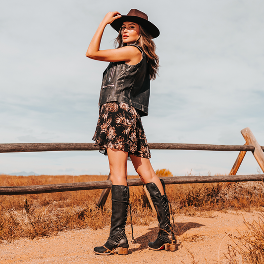 FREEBIRD women’s Coal black snake leather knee high adjustable back lacing boot lifestyle image