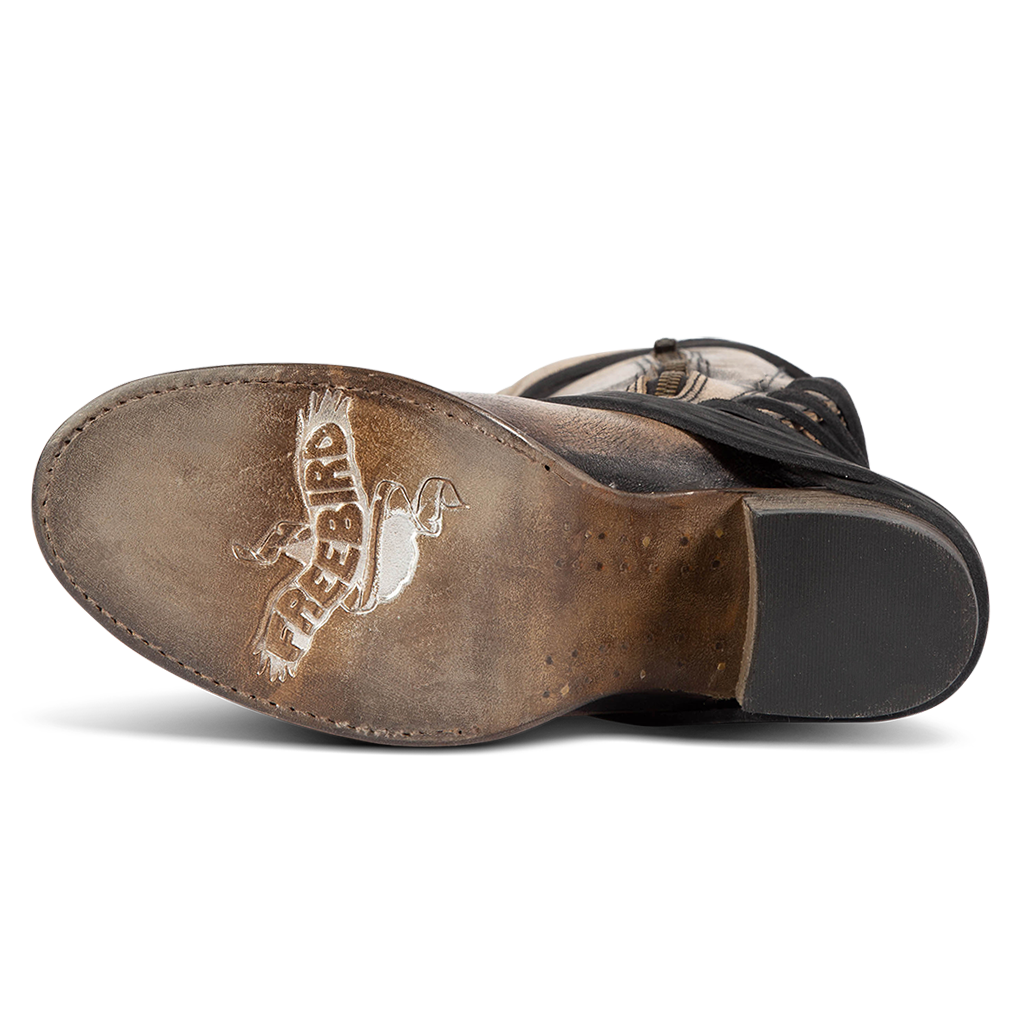 Leather sole imprinted with FREEBIRD on women's Coal pewter back lacing tall boot
