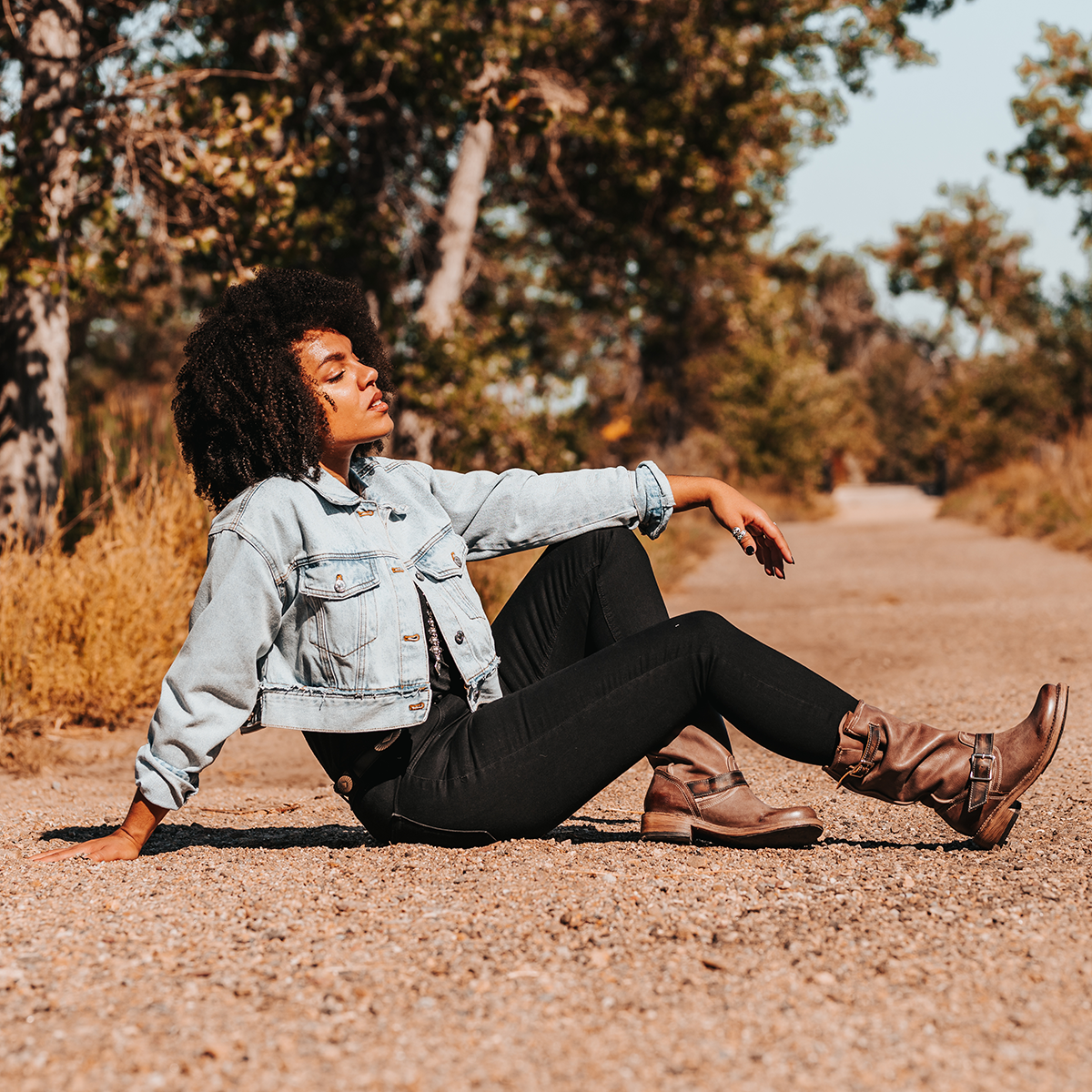 FREEBIRD women's Crosby brown featuring full grain leather, buckle straps, and a hidden pocket lifestyle