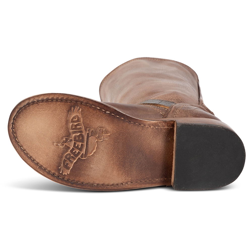 Leather sole imprinted with FREEBIRD on women's Crosby brown leather boot