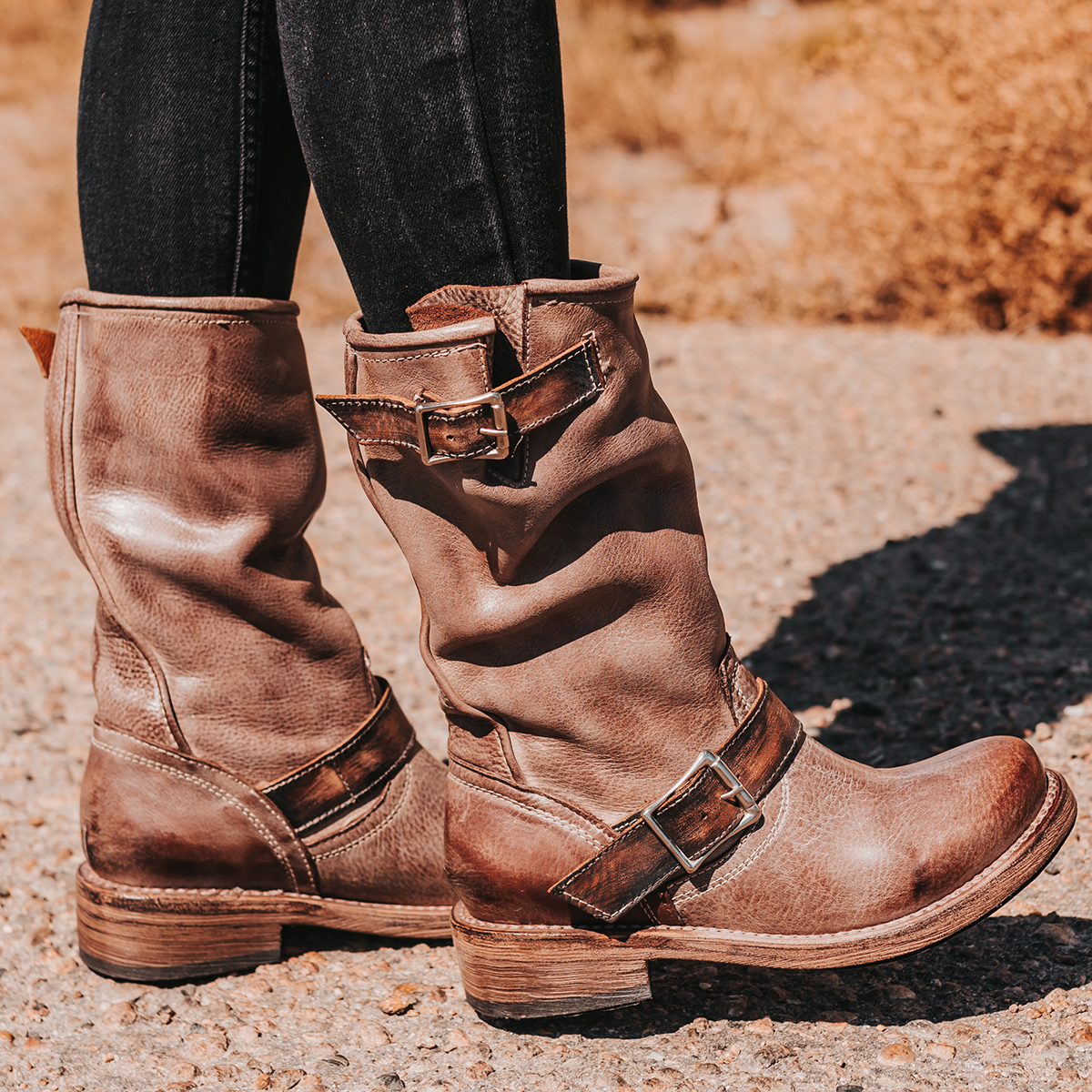 FREEBIRD women's Crosby brown featuring full grain leather, buckle straps, and a hidden pocket