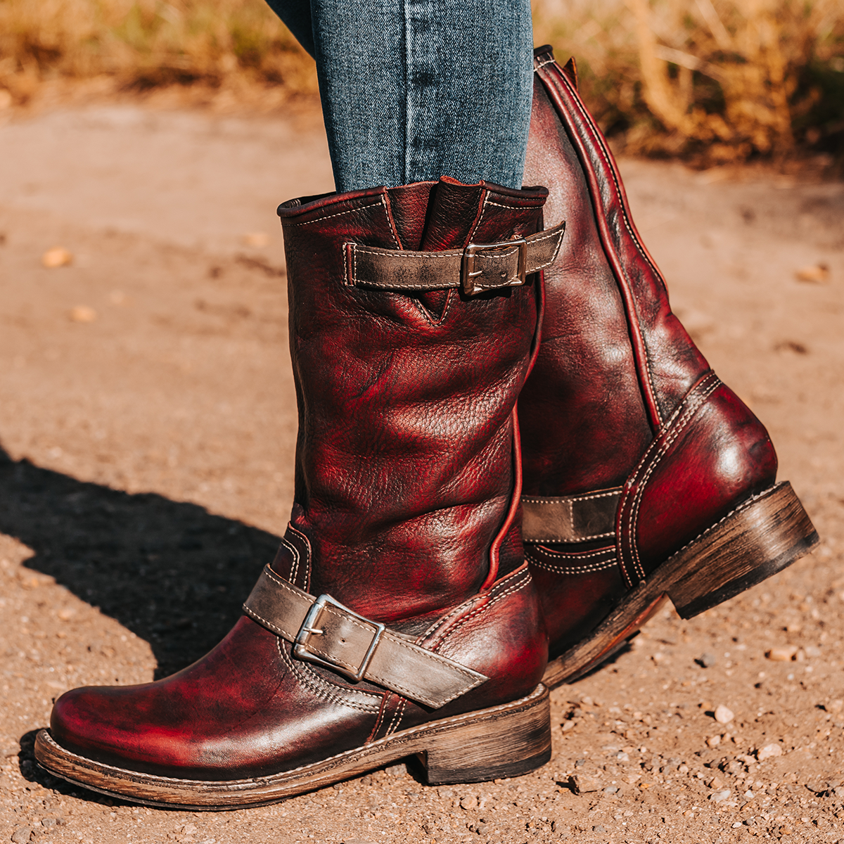FREEBIRD women's Crosby wine featuring full grain leather, buckle straps, and a hidden pocket