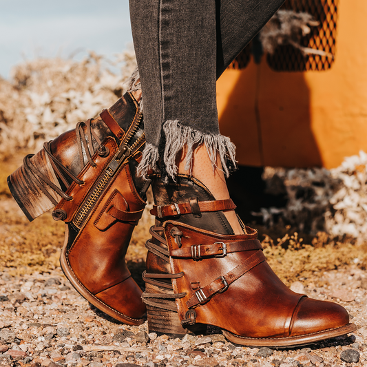 FREEBIRD women's Crue cognac leather cutout ankle bootie with silver hardware straps and back lacing detail