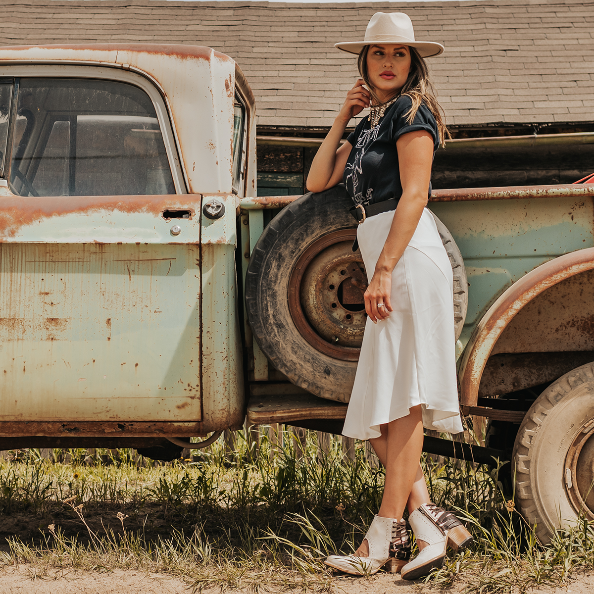 FREEBIRD Desert white multi bootie with leather straps and working buckles lifestyle image