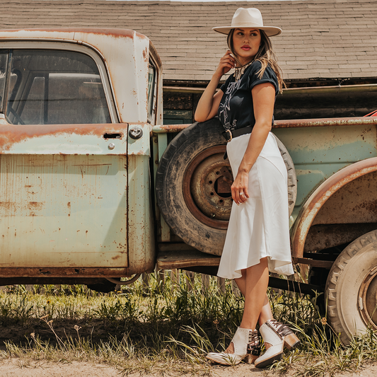 FREEBIRD Desert white multi bootie with leather straps and working buckles lifestyle image