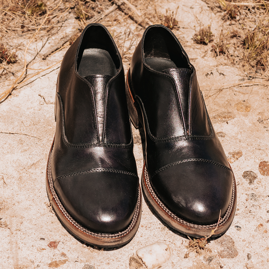 FREEBIRD men's Detrick black slip-on loafer with an almond toe and flexible tongue