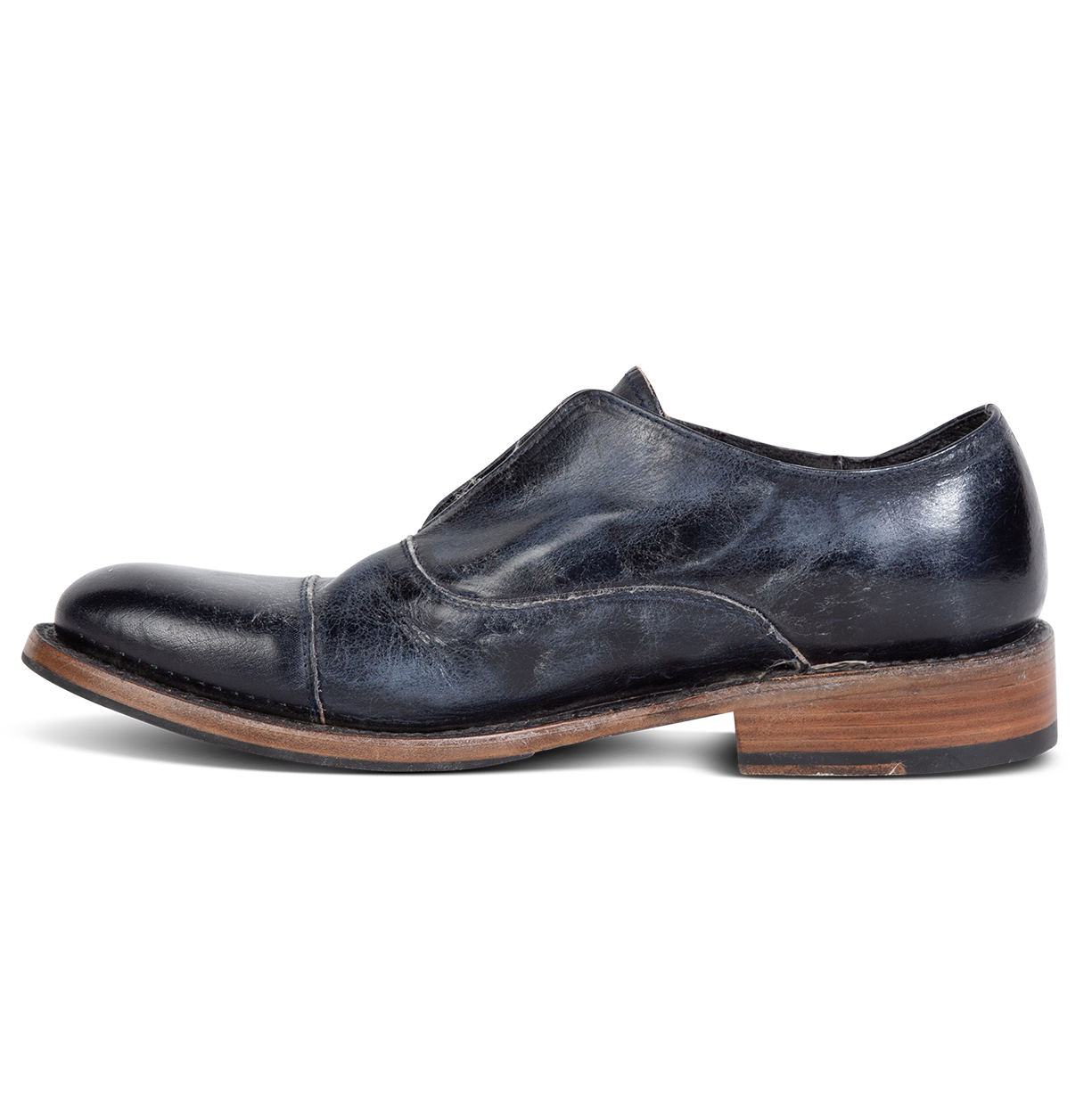 Inside view showing stitch detailing and low heel on FREEBIRD men's Detrick navy shoe