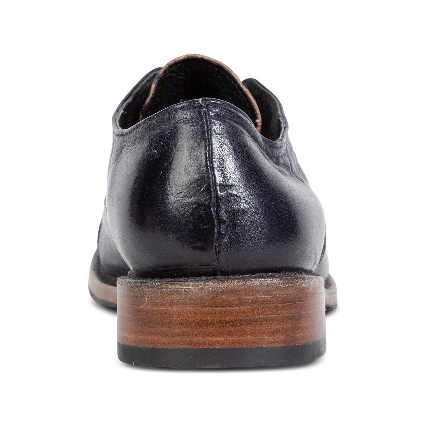 Back view showing low heel on FREEBIRD men's Detrick navy shoe
