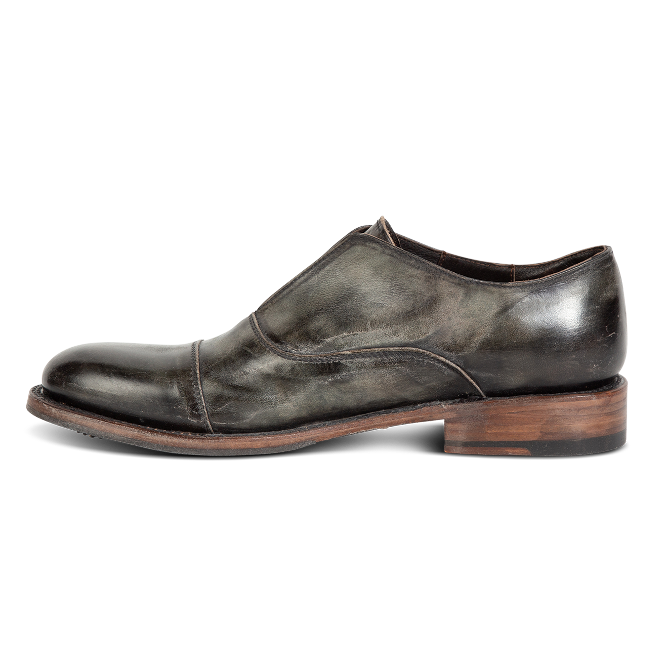 Inside view showing stitch detailing and low heel on FREEBIRD men's Detrick olive shoe