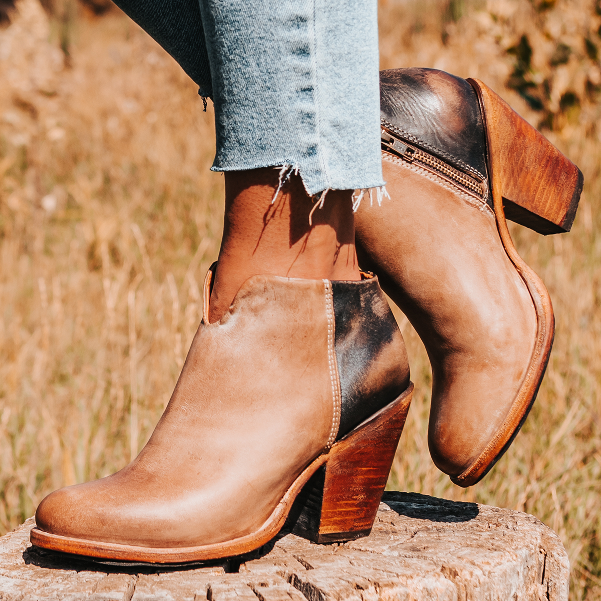 FREEBIRD women's Detroit taupe featuring inverted heel, front cut out dip, and two toned full grain leather