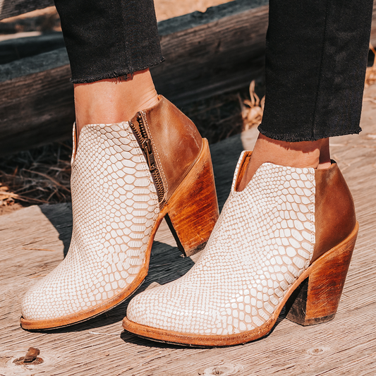 FREEBIRD women's Detroit white snake featuring inverted heel, front cut out dip, and two toned full grain leather