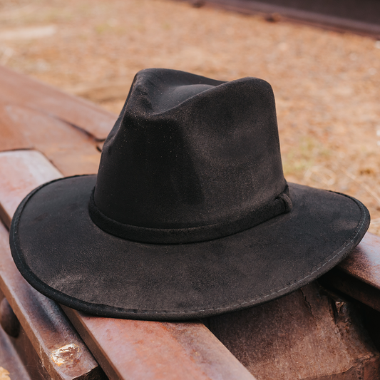 FREEBIRD Dora black minimalistic hat featuring teardrop crown and relaxed-brim 