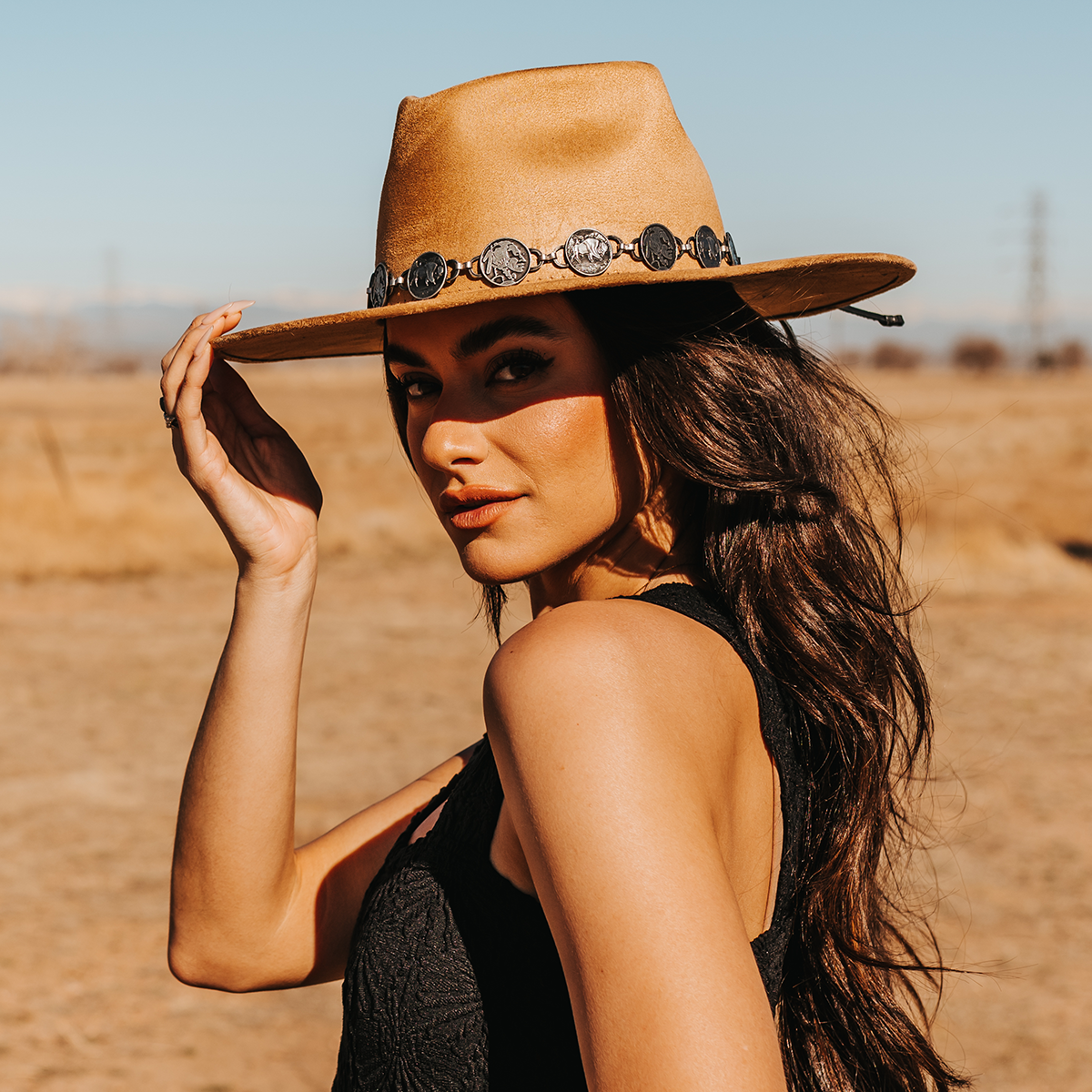 FREEBIRD Gemini camel wide flat-brim hat featuring diamond-shaped crown and metal coin band lifestyle