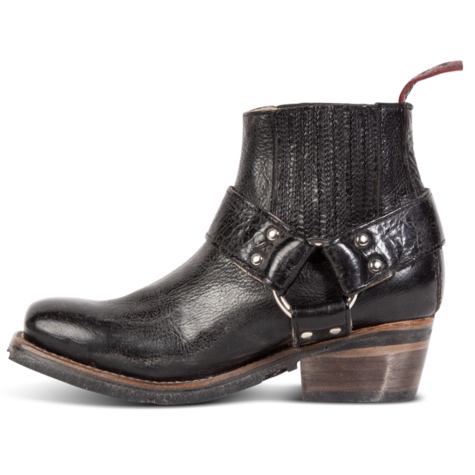 Inside view showing gore construction and leather ankle harness with silver hardware on FREEBIRD women's Whiskey black ankle bootie