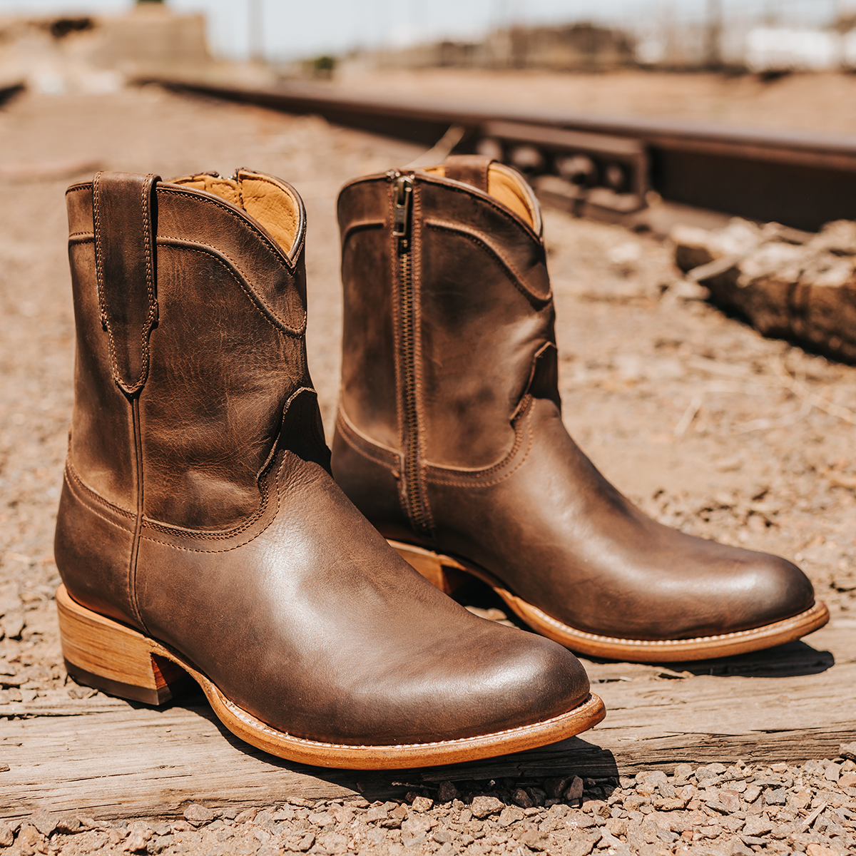 FREEBIRD men's Henderson brown leather exterior pull strap and inside working zip closure with a traditional toe