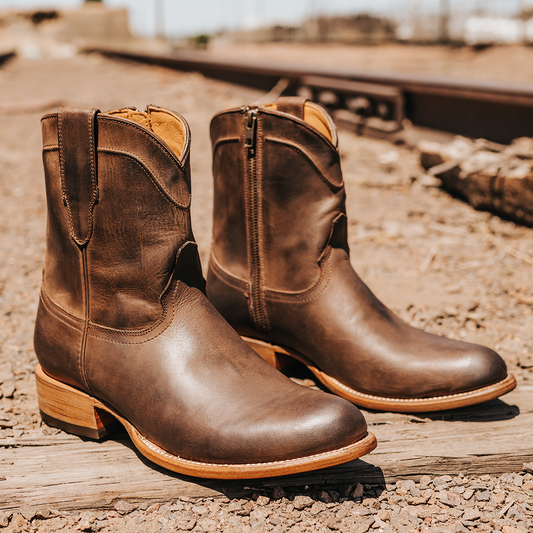 FREEBIRD men's Henderson brown leather exterior pull strap and inside working zip closure with a traditional toe