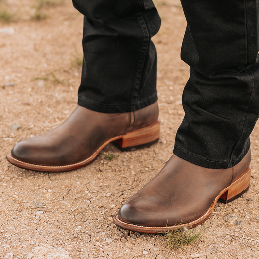 FREEBIRD men's Henderson brown leather exterior pull strap and inside working zip closure with a traditional toe
