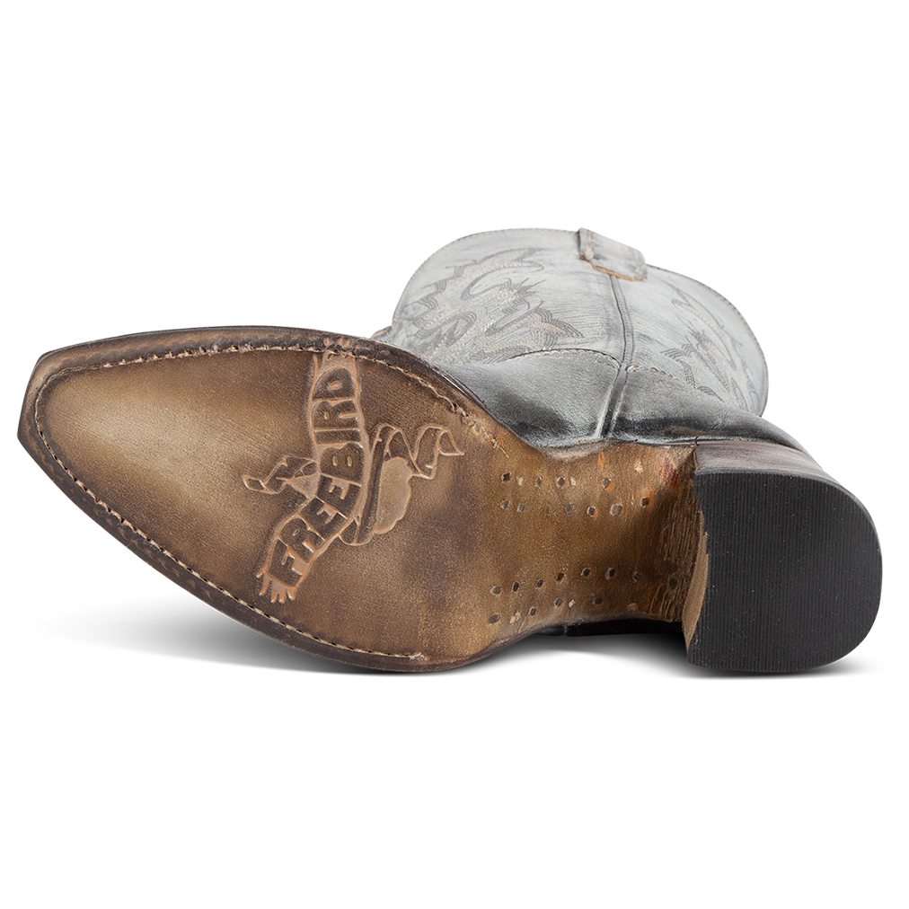 Leather sole imprinted with FREEBIRD on women's Jackson ice leather high heel western boot