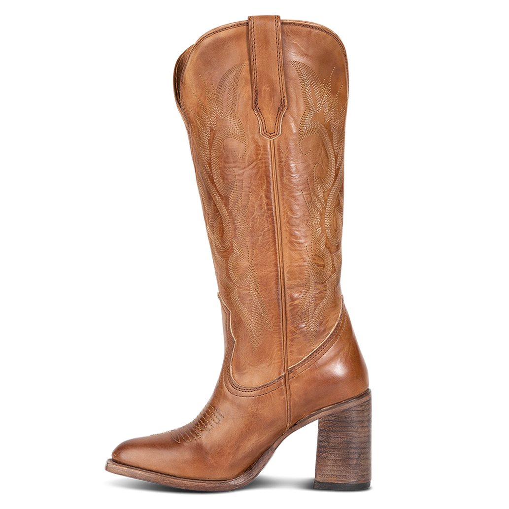 Side view showing leather pull straps and stitch detailing on FREEBIRD women's Jackson tan leather high heel western boot