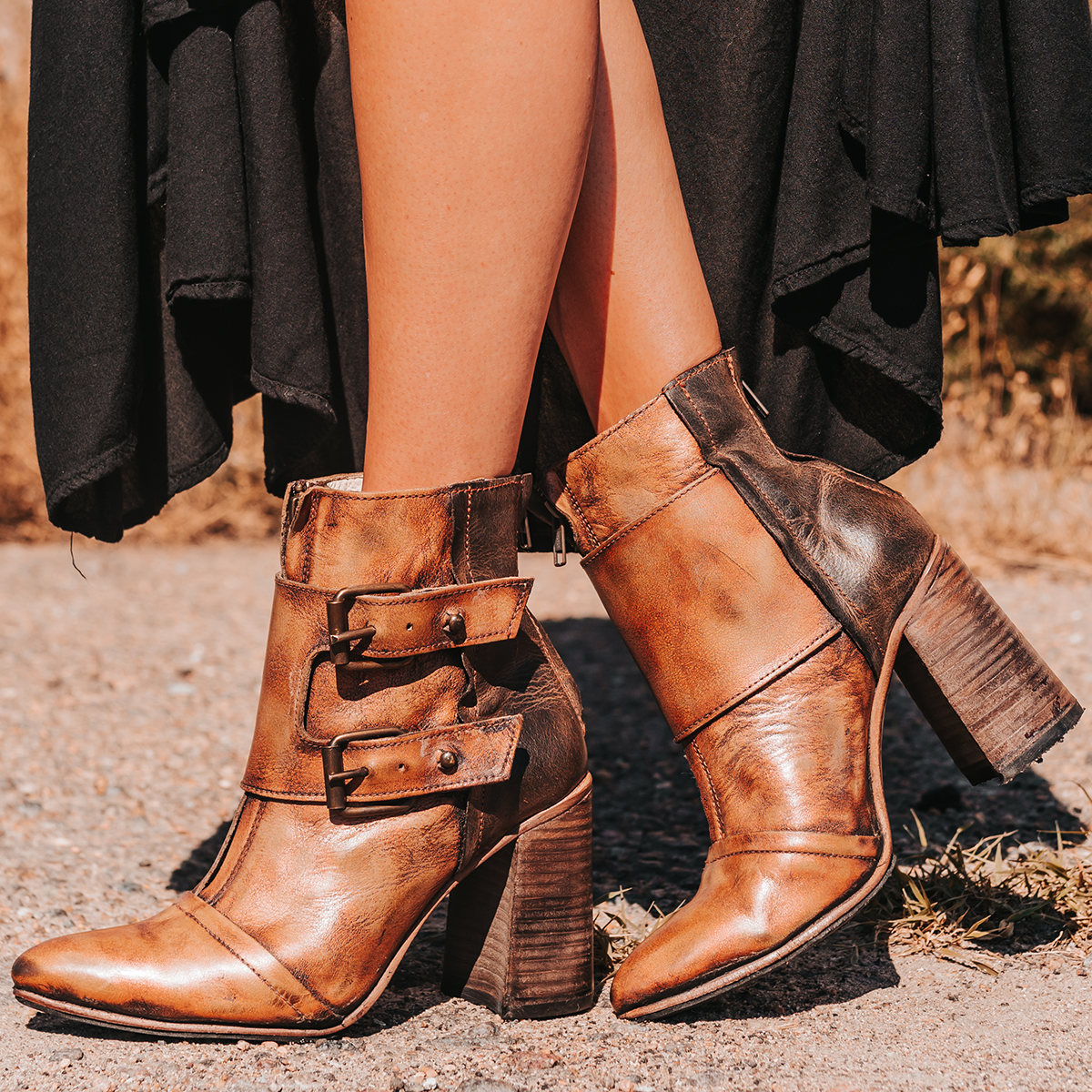 FREEBIRD women's Joey bronze embossed leather bootie with flare heel and brass buckles