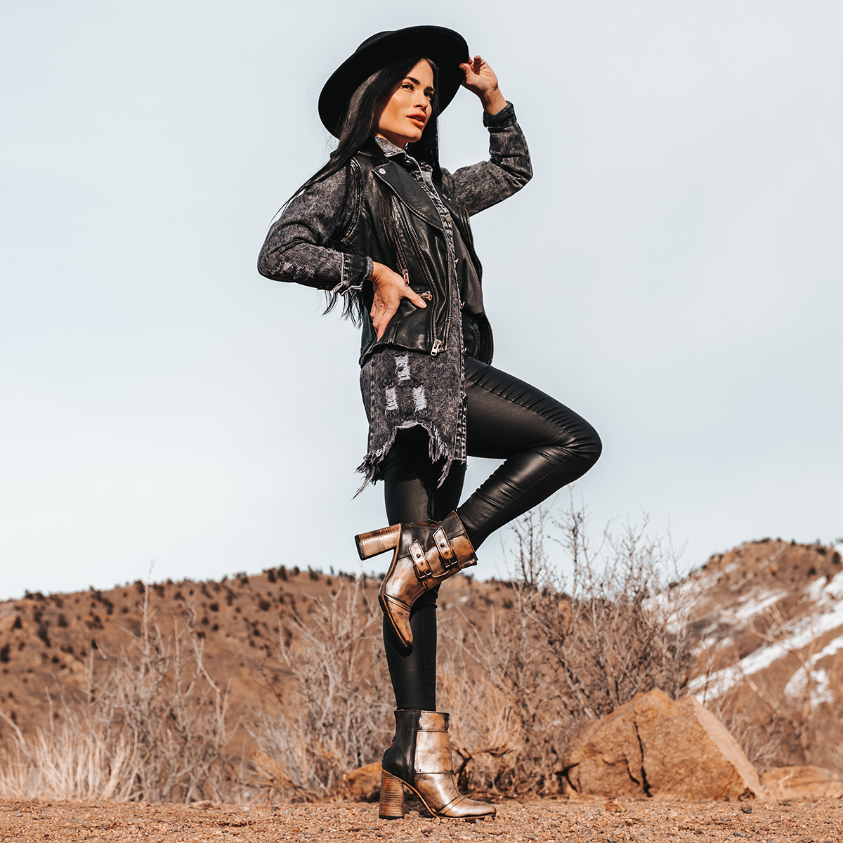 FREEBIRD women's Joey pewter embossed leather bootie with flare heel and brass buckles lifestyle