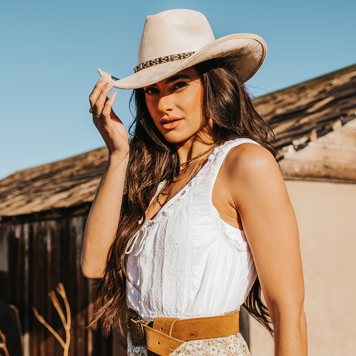 FREEBIRD Jones beige western cowboy hat featuring teardrop crown, upturned-brim, and braided leather band lifestyle
