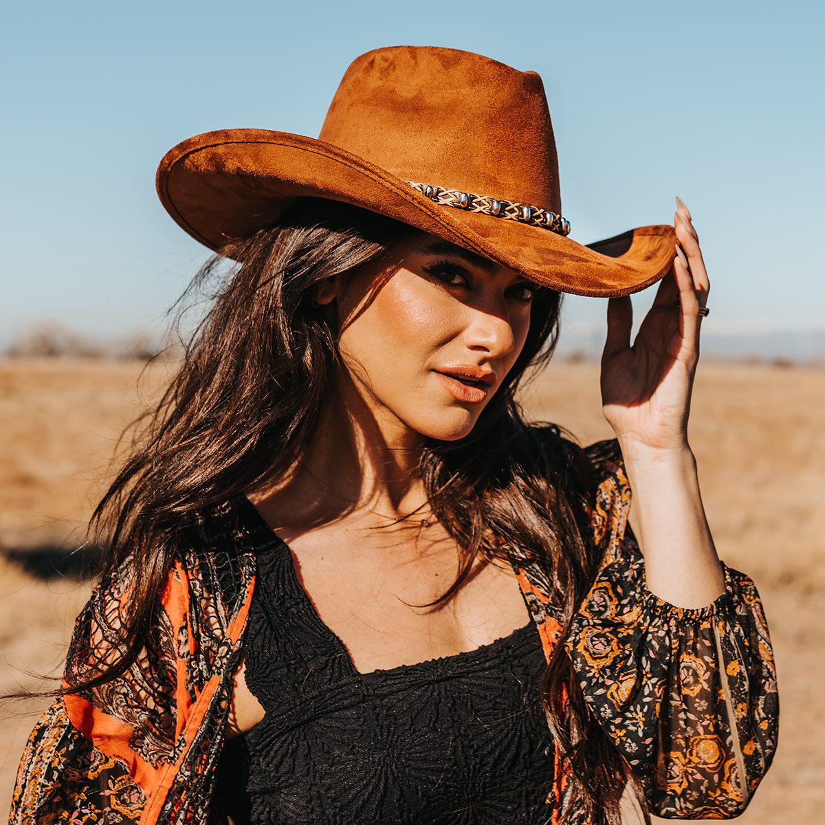 FREEBIRD Jones rust western cowboy hat featuring teardrop crown, upturned-brim, and braided leather band lifestyle