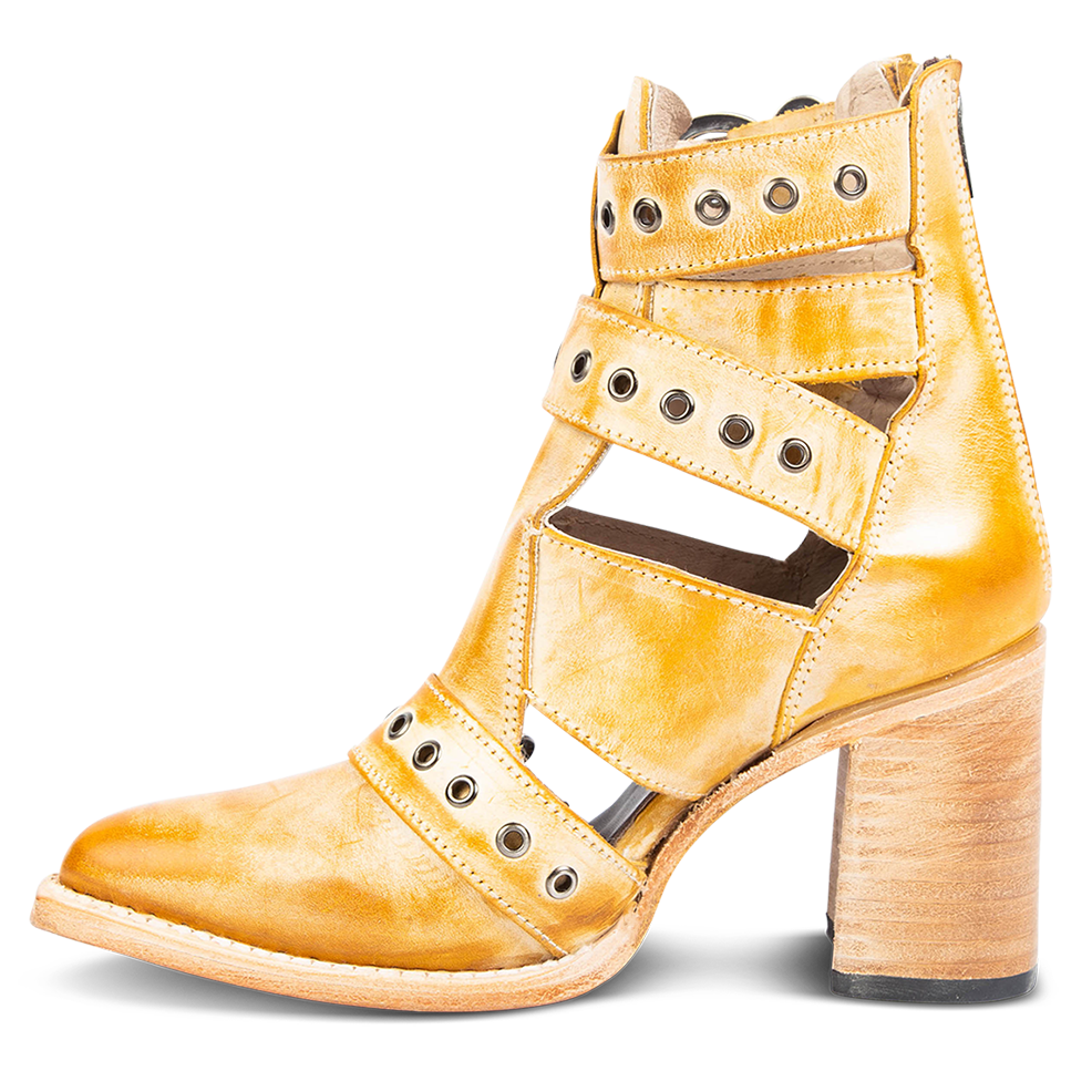 Inside view showing open cut outs and metal eyelets on FREEBIRD women's Joplin banana leather ankle bootie