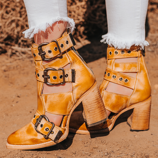 FREEBIRD women's Joplin banana leather ankle bootie with buckles, flare heel, and pointed toe
