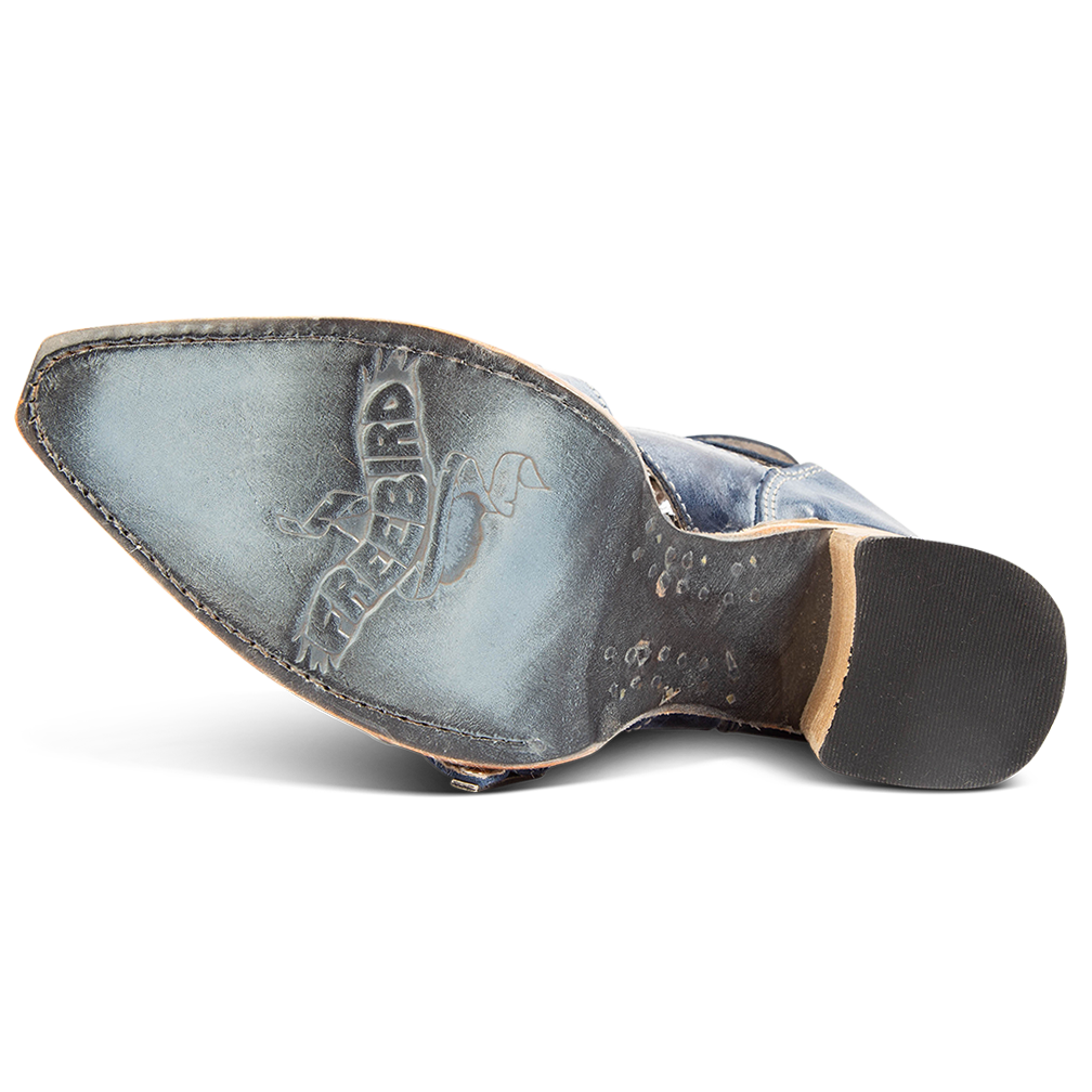 Leather sole imprinted with FREEBIRD on women's Joplin navy leather ankle bootie