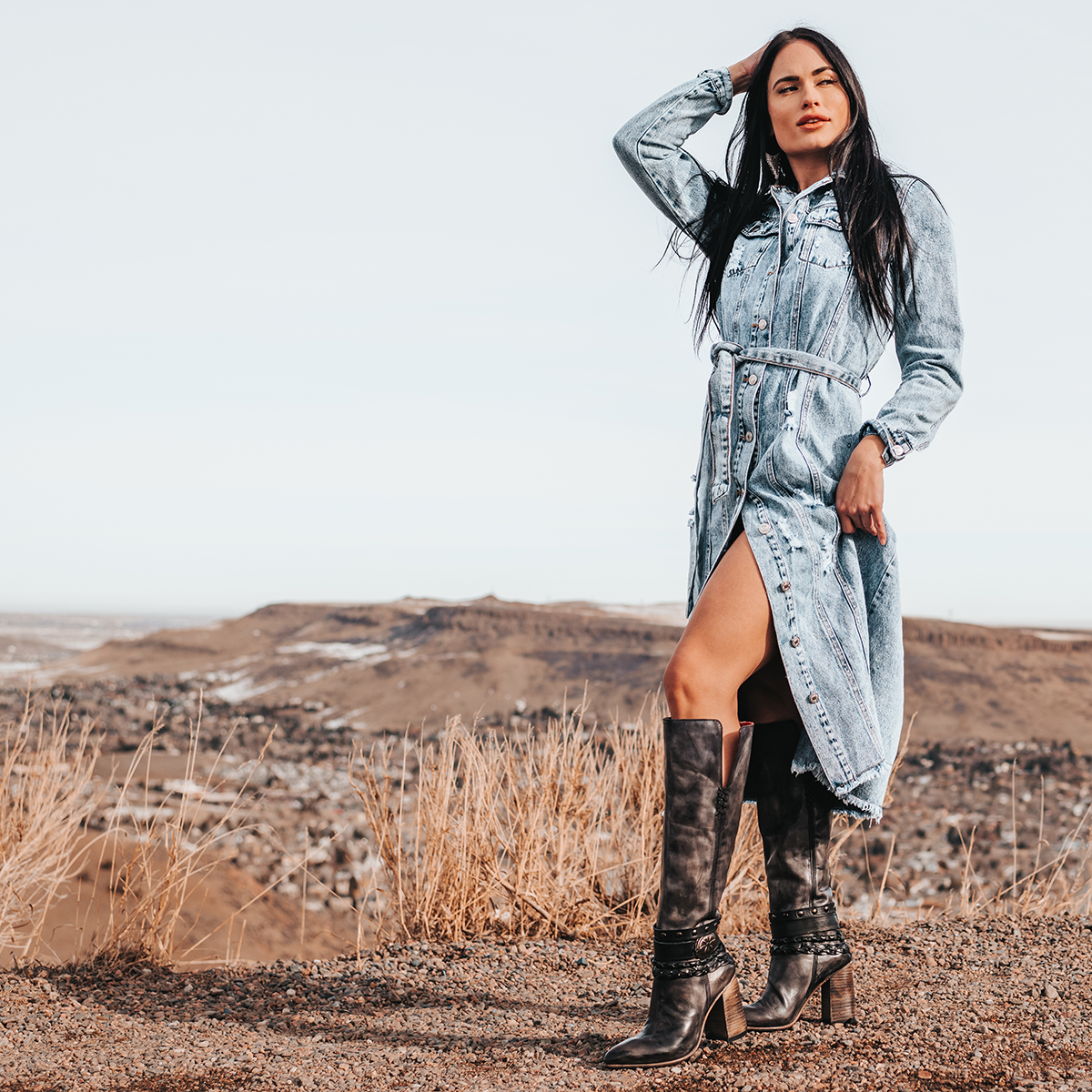 FREEBIRD women's Juniper black heeled boot featuring a pointed toe, back zip closure, and braided and studded ankle straps lifestyle