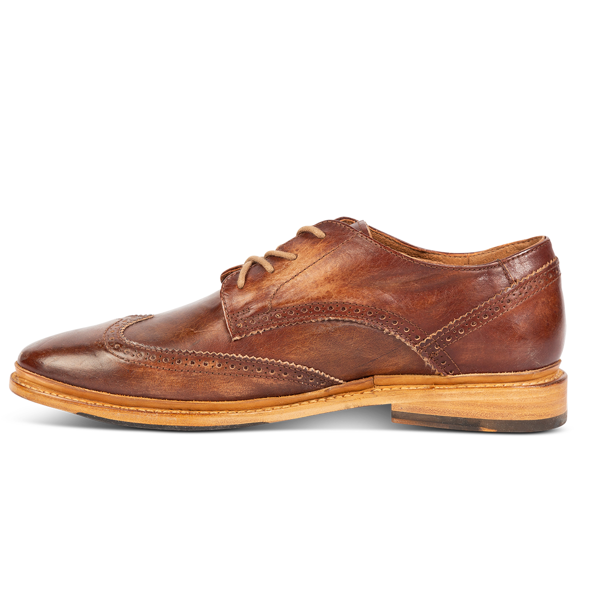 Inside view showing stitch detailing and low heel on FREEBIRD men's Kensington cognac shoe