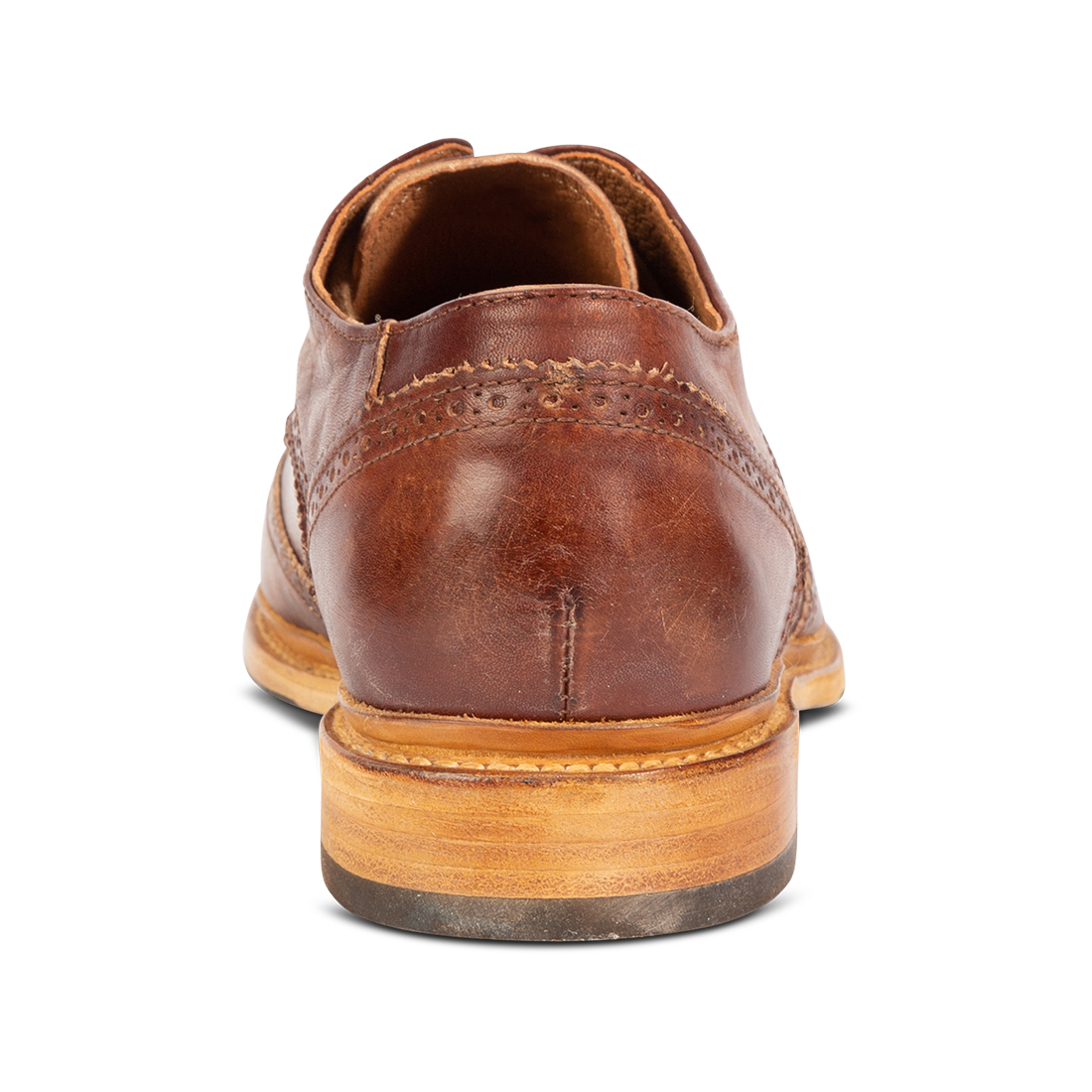 Back view showing low heel on FREEBIRD men's Kensington cognac shoe