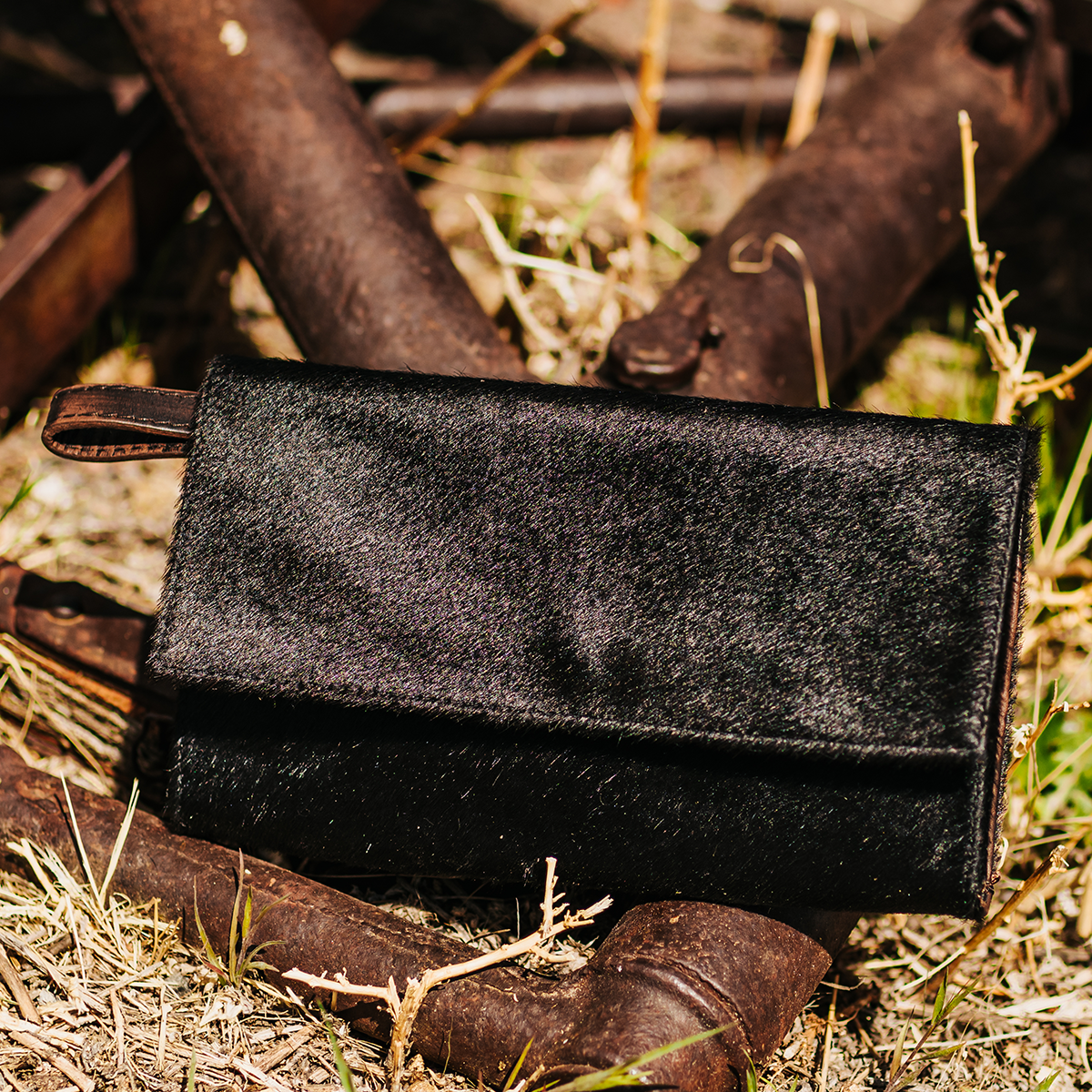 FREEBIRD lola black clutch with interchangeable wrist strap and adjustable cross-body strap and multiple interior pockets
