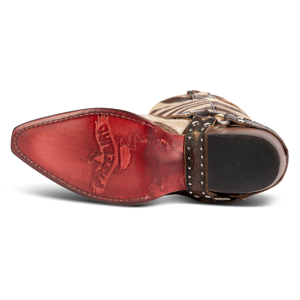 Red leather sole imprinted with FREEBIRD on women's Lusitano jungle boot
